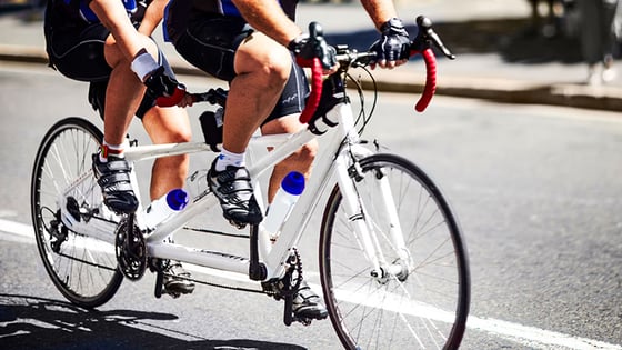 Tandem-bike-merger-together